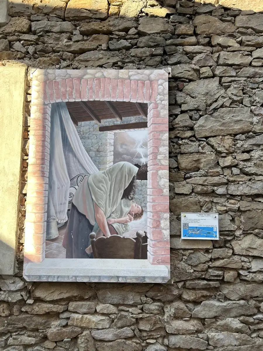 Opera n. 10b «Il ratto del fanciullo» nel Borgo Affrescato di Parlasco